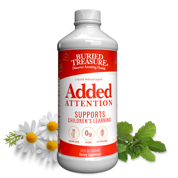 A bottle of Buried Treasure Liquid Advantage Added Attention Children's Liquid Supplement with DHA, B Vitamins, Phospholipids. The label shows the product name, mentions it supports children's learning, and lists some of the ingredients like Lemon Balm and Chamomile.